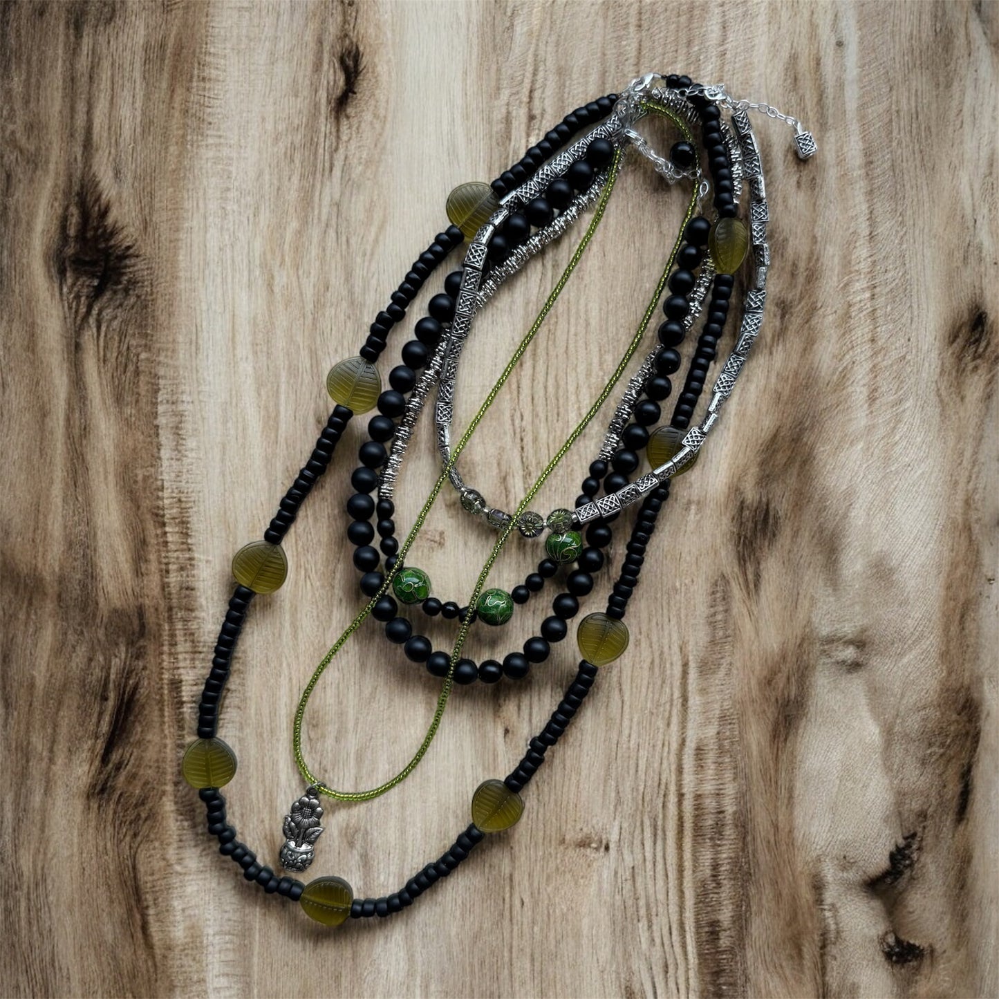 Silver Celtic Necklace Featuring Delicate Glass Flowers